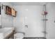 Bright bathroom featuring white subway tile, vessel sink, and rustic vanity at 8922 Pritcher Rd, Lithia, FL 33547