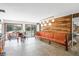 Bright living room with access to the outdoor pool area and ample seating at 8922 Pritcher Rd, Lithia, FL 33547