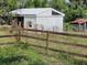 Shed and other outbuildings in fenced grassy area at 8922 Pritcher Rd, Lithia, FL 33547