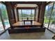 Spacious Zen Room with a unique wooden table and comfortable floor seating at 8922 Pritcher Rd, Lithia, FL 33547