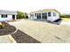 Backyard area featuring decorative gravel and dark mulch at 1046 Lee St, Englewood, FL 34224