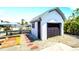 Exterior view of storage shed and dock at 1046 Lee St, Englewood, FL 34224