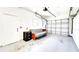 Spacious two car garage featuring futon for relaxing at 1046 Lee St, Englewood, FL 34224