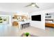 Open-concept living space combining living room, kitchen, and dining area for easy entertaining at 1046 Lee St, Englewood, FL 34224