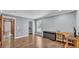 Bedroom featuring neutral walls, a wood floor, and a walk-in closet near the window at 3517 Ralston Rd, Plant City, FL 33566