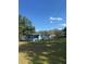 Charming home with a spacious yard, perfect for outdoor activities and relaxation at 37906 Tucker Rd, Zephyrhills, FL 33542