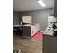 Spacious kitchen with granite countertops, center island, and modern appliances at 37906 Tucker Rd, Zephyrhills, FL 33542