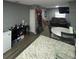 Living area with a dining space, open kitchen, and comfortable seating at 37906 Tucker Rd, Zephyrhills, FL 33542