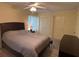 Comfortable bedroom featuring a closet for storage and natural light from the window at 3232 Lake Pine E Way # G1, Tarpon Springs, FL 34688