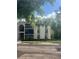 Inviting condominium featuring well-maintained landscaping and a private entrance at 3232 Lake Pine E Way # G1, Tarpon Springs, FL 34688