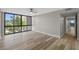 Large bedroom features ceiling fan, hardwood floors, and a window with outdoor view at 3301 Bayshore Blvd # 503, Tampa, FL 33629