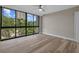 Bedroom with views of downtown from floor-to-ceiling windows at 3301 Bayshore Blvd # 503, Tampa, FL 33629