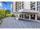 Elegant entrance to Monte Carlo Towers with covered drop-off and attractive brick driveway at 3301 Bayshore Blvd # 503, Tampa, FL 33629
