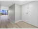 Bright hallway with wood floors leads to an apartment with a stunning water view at 3301 Bayshore Blvd # 503, Tampa, FL 33629