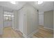 Hallway leading to bath with closet and updated flooring at 3301 Bayshore Blvd # 503, Tampa, FL 33629
