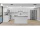 Modern kitchen boasts white cabinets, stainless steel appliances, and a stylish island at 3301 Bayshore Blvd # 503, Tampa, FL 33629