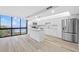 Bright kitchen features white cabinets, stainless appliances, and a large window with a water view at 3301 Bayshore Blvd # 503, Tampa, FL 33629
