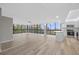 Spacious living area with large windows offering great outdoor views next to modern kitchen at 3301 Bayshore Blvd # 503, Tampa, FL 33629
