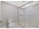 Luxurious walk-in shower featuring marble-style tile and sleek glass enclosure at 3301 Bayshore Blvd # 503, Tampa, FL 33629