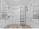 Spacious walk-in closet features custom built-in shelving units and ample storage space at 3301 Bayshore Blvd # 503, Tampa, FL 33629