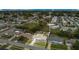 Aerial view of the property highlighting its landscaped yard and neighborhood setting at 3432 Monticello St, Holiday, FL 34690