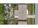 Birds eye view of home with fenced backyard, shed, and patio at 3432 Monticello St, Holiday, FL 34690