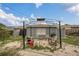 Backyard with metal gazebo, perfect for enjoying outdoor living and entertaining at 3432 Monticello St, Holiday, FL 34690