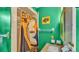 Colorful bathroom featuring a shower with curtain and single vanity at 4142 El Shaddiai Sq, Plant City, FL 33565