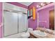 Bathroom with shower, cabinets and sink at 4142 El Shaddiai Sq, Plant City, FL 33565