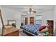 Bright bedroom with built-in shelves and natural light at 4142 El Shaddiai Sq, Plant City, FL 33565