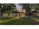 Charming single-story brick home featuring mature landscaping and a spacious lot at 4142 El Shaddiai Sq, Plant City, FL 33565