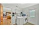 Well-lit laundry area with washer, dryer, and additional storage space at 4142 El Shaddiai Sq, Plant City, FL 33565