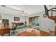 Cozy living room with a sliding glass door leading to the lanai at 4142 El Shaddiai Sq, Plant City, FL 33565