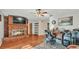 Features a fireplace, wood floors, and is a large and open space at 4142 El Shaddiai Sq, Plant City, FL 33565
