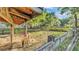 Picturesque pasture featuring a horse, wooden fence, and lush green trees at 4142 El Shaddiai Sq, Plant City, FL 33565