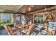 Outdoor patio with seating, ceiling fan, and views of backyard at 4142 El Shaddiai Sq, Plant City, FL 33565