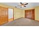 Bedroom with closet and access to other rooms at 4910 Thonotosassa Rd, Plant City, FL 33565