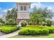 Welcoming Ventura Bay entrance featuring manicured landscaping and stone accents at 2125 Wild Grape Pl, Riverview, FL 33578