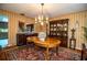 The dining room has an oval wood table with china cabinets and side table at 4101 N Forbes Rd, Plant City, FL 33565