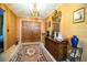 Inviting entryway featuring unique decor, and a decorative mirror, creating a warm welcome at 4101 N Forbes Rd, Plant City, FL 33565