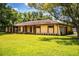 Charming single-story home with a well-maintained lawn and inviting curb appeal at 4101 N Forbes Rd, Plant City, FL 33565