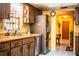 Efficient kitchen with stainless steel appliances, wood cabinets, and bright countertops at 4101 N Forbes Rd, Plant City, FL 33565