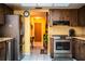 Well-maintained kitchen featuring stainless steel appliances and wood cabinetry with an eat-in breakfast nook at 4101 N Forbes Rd, Plant City, FL 33565