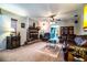 Spacious living room featuring brick fireplace, comfortable seating and decorative accent furniture at 4101 N Forbes Rd, Plant City, FL 33565