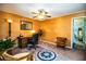 Cozy office featuring a desk, chair, and vintage decor on textured wallpaper at 4101 N Forbes Rd, Plant City, FL 33565