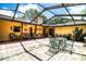 Outdoor patio with covered seating and overhead structure offering natural light at 4101 N Forbes Rd, Plant City, FL 33565