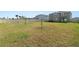 A large backyard area with a white fence around the perimeter at 8009 Sail Clover Ln, Zephyrhills, FL 33540