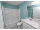 Bathroom featuring a shower-tub combo and a single sink vanity at 8009 Sail Clover Ln, Zephyrhills, FL 33540