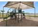 Community playground featuring slides, climbing equipment, and a shaded canopy for outdoor fun at 8009 Sail Clover Ln, Zephyrhills, FL 33540