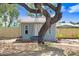Charming backyard outbuilding with a hanging swing and a well-maintained yard, great for storage at 1411 Fernwood Pl, Seffner, FL 33584